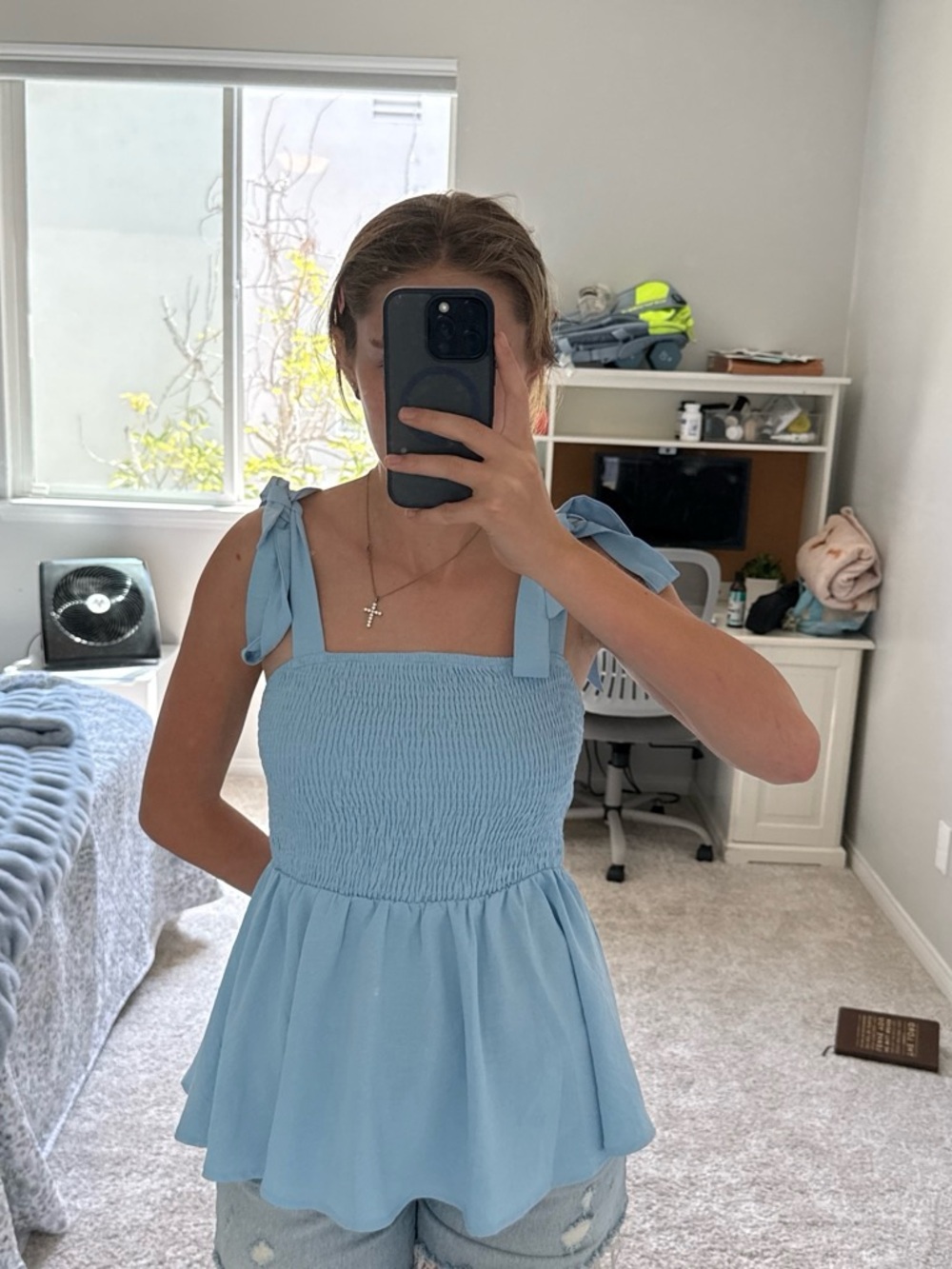 Light blue flowy top with adjustable straps